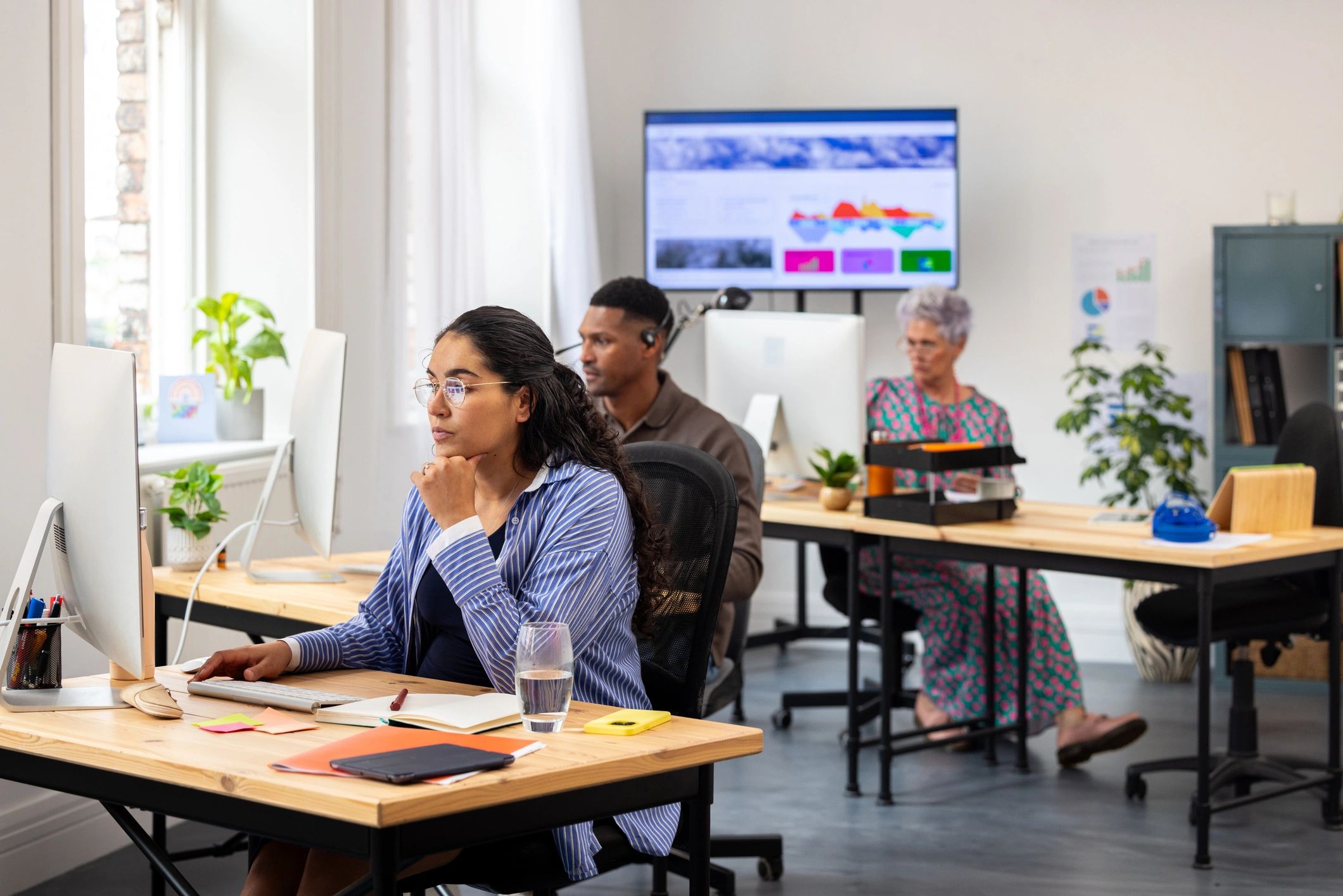 Professional office team working with data and systems