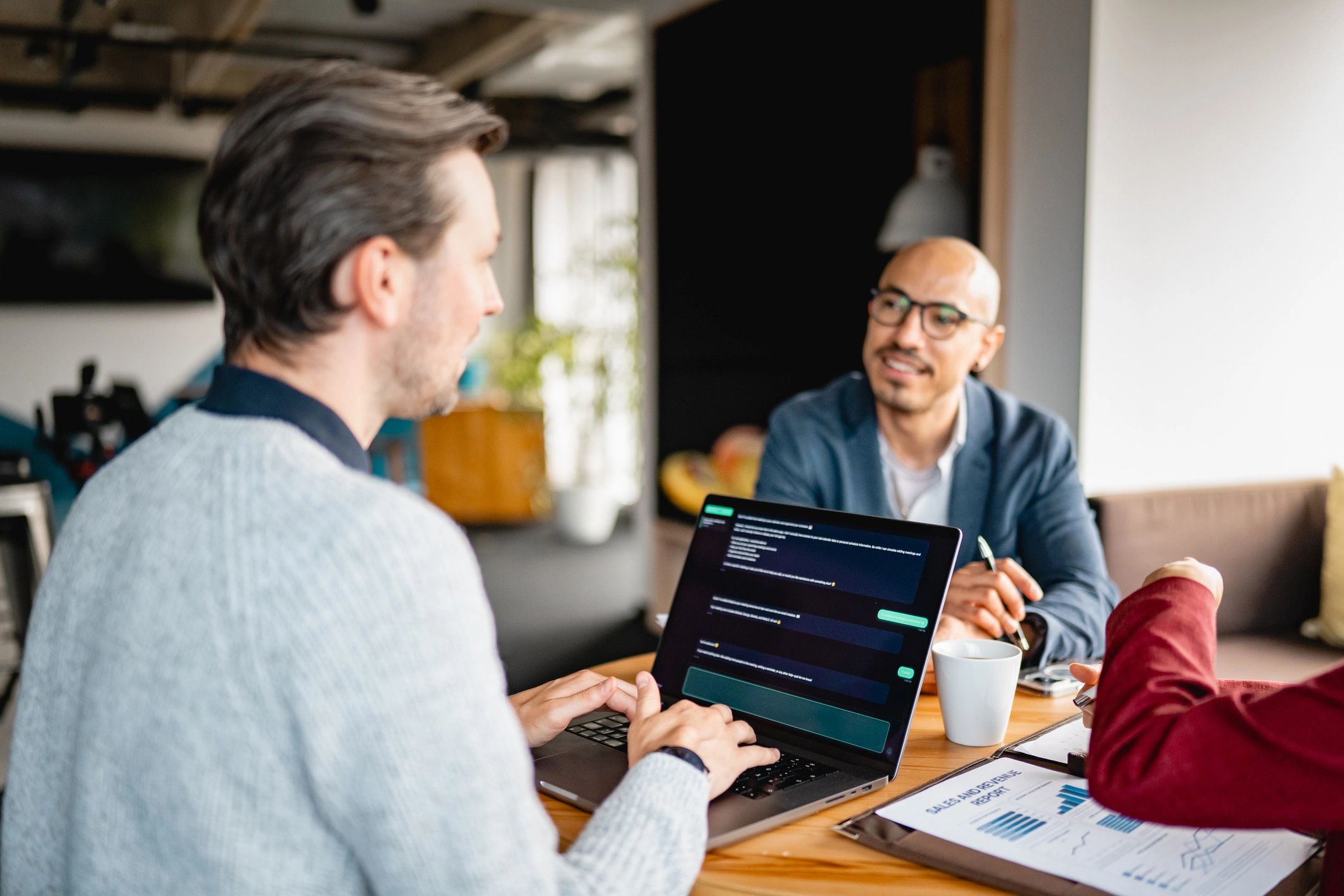 Business technology team collaborating in a modern office
